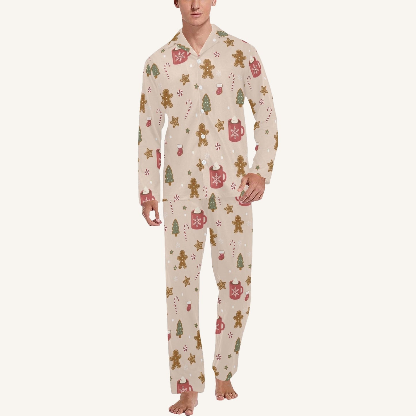 Person wearing a festive onesie with gingerbread men and cookies design on a white background