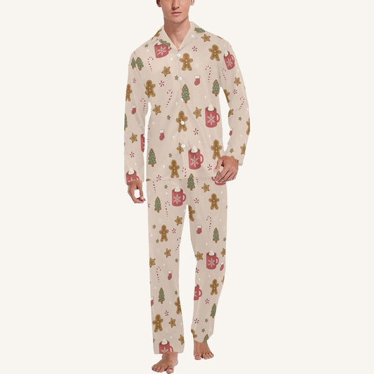 Person wearing a festive onesie with gingerbread men and cookies design on a white background